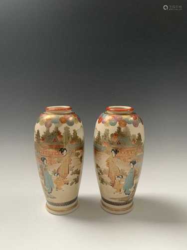 A pair of Japanese satsuma vases, Meiji Period, signed, each decorated with a river scene with