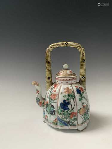 A Chinese famille verte porcelain kettle, Kangxi Period, the yellow ground handle with horizontal