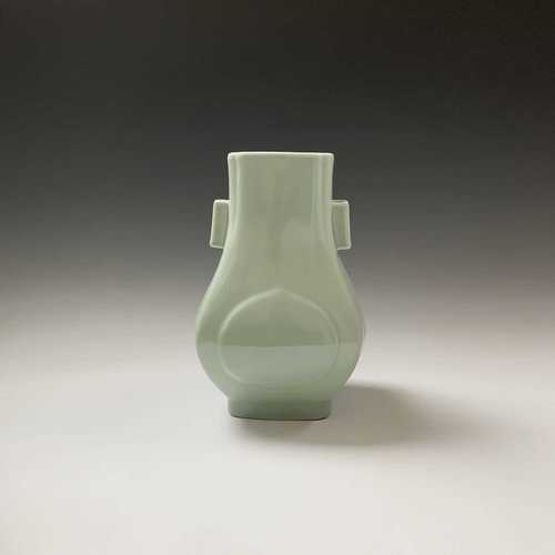 A Chinese celadon hu-form vase, Guangxu Period, with square section lug handles, six character marks