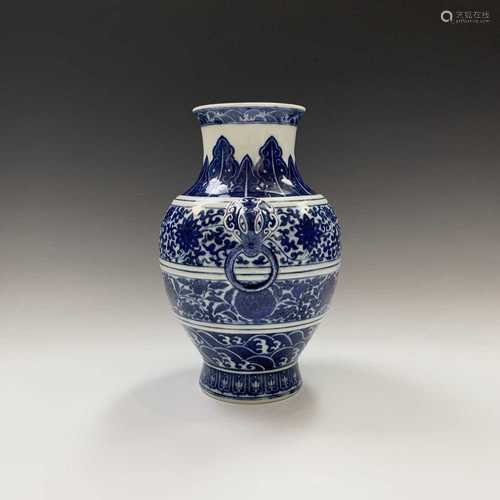 A Chinese blue and white porcelain archaistic hu-form vase, Qianlong seal mark in underglaze blue,