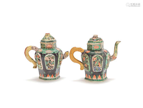 Two famille verte biscuit reticulated ewers and covers Kangxi