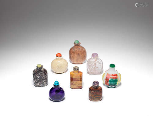A selection of variously glass, hardstone, porcelain and wood snuff bottles 19th century