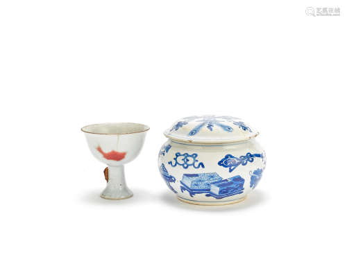 A blue and white box and cover and a copper-red decorated 'fish' stem cup Kangxi and later