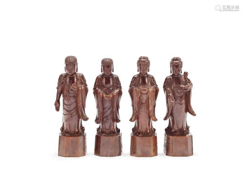 Four hardwood Buddhist figures from a set Late Qing Dynasty