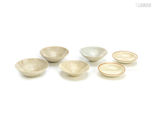 A group of six variously carved and moulded Qingbai bowls and dishes Song/Yuan Dynasty and possibly later