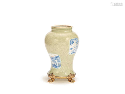 A carved celadon-glazed underglaze blue and copper-red baluster vase Kangxi