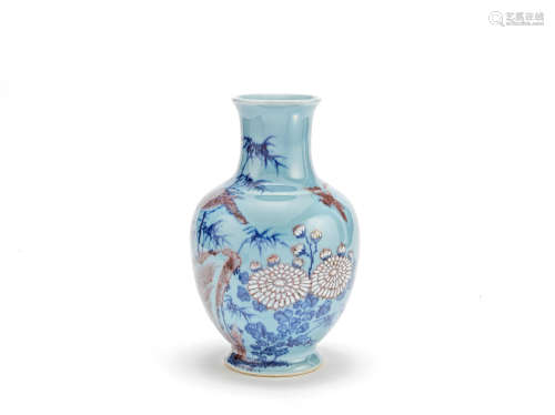 An underglaze blue, red and slip-decorated pale blue glazed vase 18th/19th century