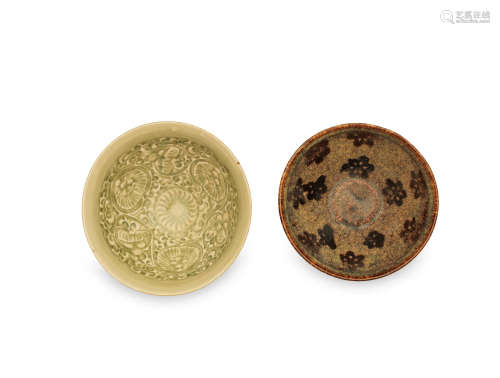 A carved Yaozhou bowl and a Jihou papercut 'prunus bowl' Song Dynasty