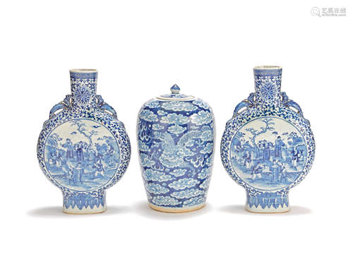 A pair of blue and white moonflasks and a blue and white 'dragon' jar and cover 19th Century