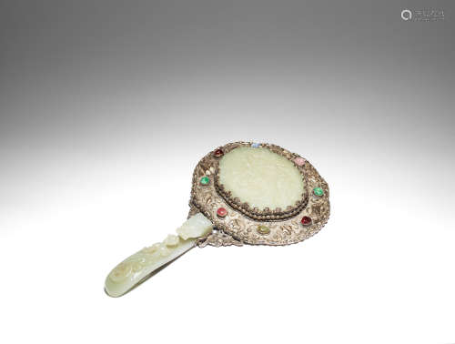 A pale green jade-mounted and embellished silver hand mirror Late Qing Dynasty