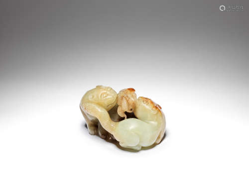 A pale green and russet jade carving 'cats and butterfly' carving 18th century