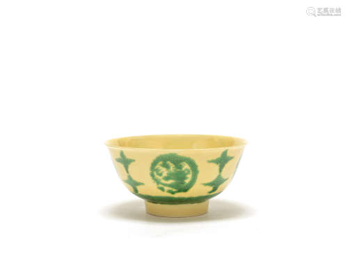 A yellow-ground green-enamelled 'dragon medallion' bowl Kangxi six-character mark and of the period