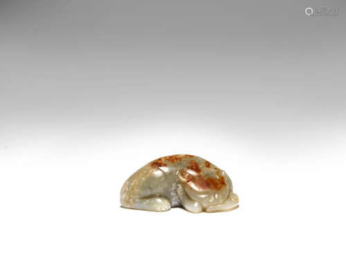 A russet skinned jade carving of a cat Qing Dynasty