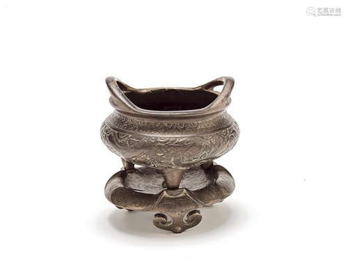 A bronze tripod incense burner with fitted bronze stand Xuande seal mark, late Qing Dynasty