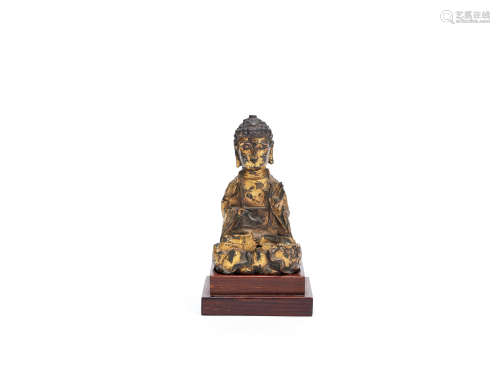 A small gilt bronze figure of Buddha Ming Dynasty