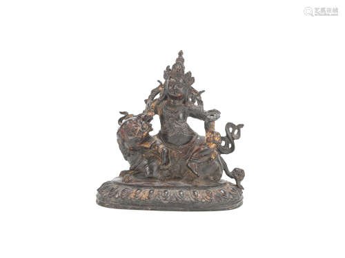 A gilt lacquered bronze figure of Jambhala Yongle six-character mark, Qing Dynasty
