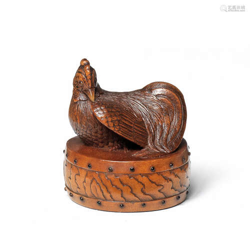 A wood netsuke of a rooster on a drum By Masakazu, Nagoya/Gifu, 19th century