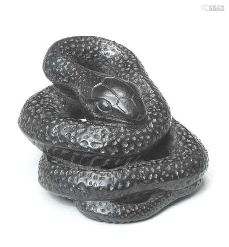 A boxwood netsuke of a coiled snake By Sari, Iwashiro Province, 19th century