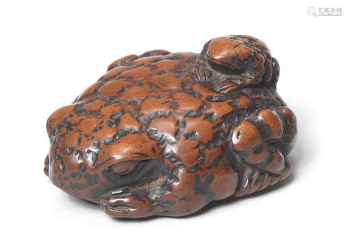 A wood netsuke of a toad and young By Tametaka, Nagoya, late 18th century