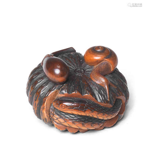 A wood netsuke of a snake and snail By Shigemasa, Nagoya, late 19th century