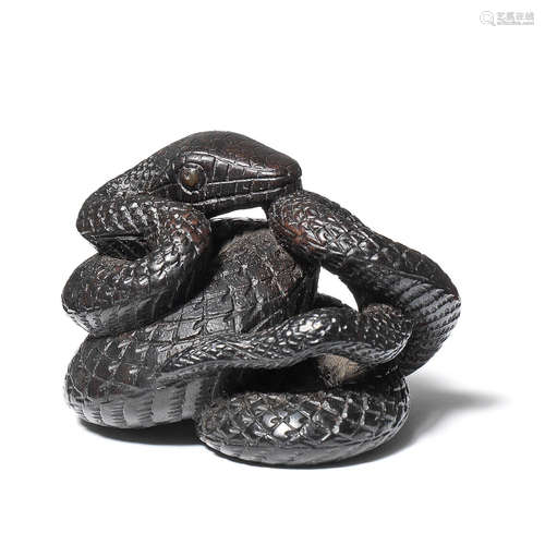 An ebony netsuke of a snake By Morimitsu, 19th century