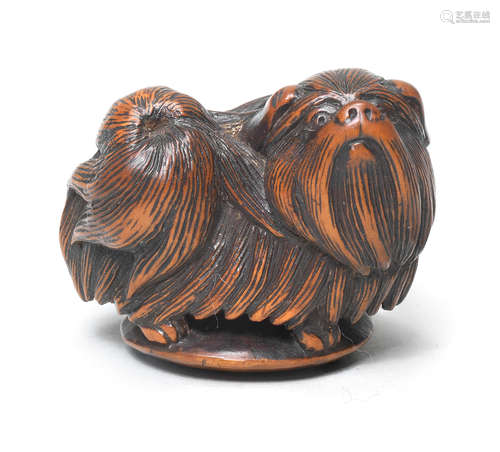 A boxwood netsuke of a Chin dog By Tametaka, Nagoya, late 18th century/early 19th century