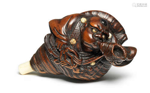 A wood netsuke of Benkei By Mitsushige, early 19th century