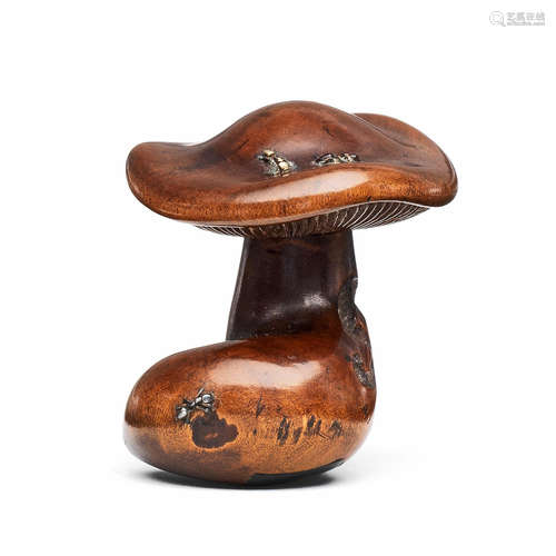 A wood netsuke of a mushroom with inlaid metal ants By Jikan Ganbun, Kyoto and Tokyo, late 19th century