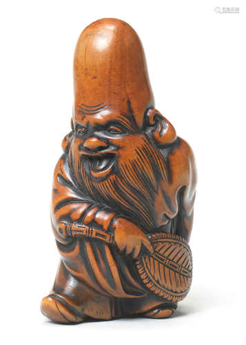 A wood netsuke of Fukurokuju By Tsuji, late 18th century