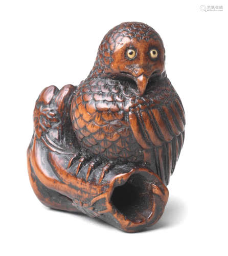 A wood netsuke of an owl 19th century