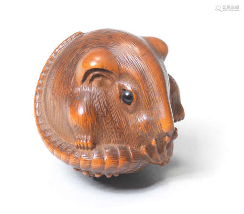 A wood netsuke of a rat By Masakazu, 19th century