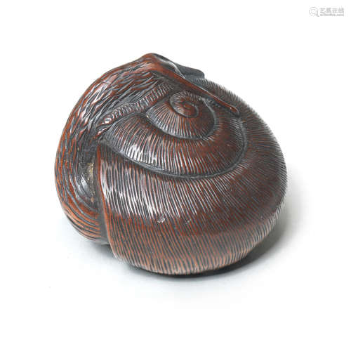 A wood netsuke of a snail By Tametaka, Nagoya, 18th century