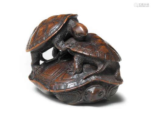 A wood netsuke of a turtle with two young By Kano Tomokazu, Gifu, mid-19th century