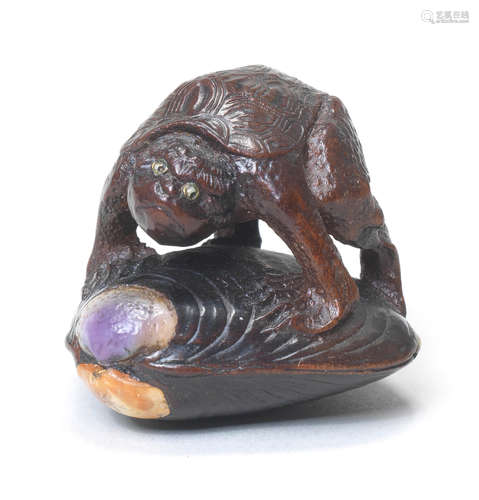 A small wood netsuke of a kappa By Gyokumin, Edo, late 18th century