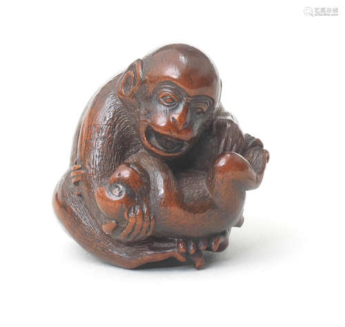 A wood netsuke of a monkey with young By Masanao, Yamada, Ise Province, early/mid-19th century