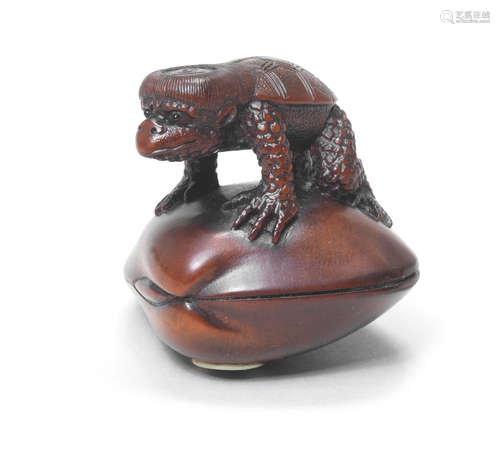 A boxwood netsuke of a kappa By Sukeharu, Takayama, Hida Province, 19th century