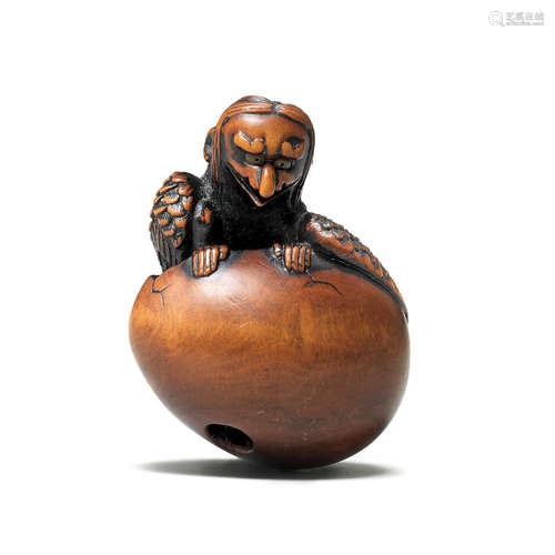 A wood netsuke of a tengu no tamago (hatching tengu) By Toyoyasu (1811-1883), Sasayama, Tanba Province, early 19th century