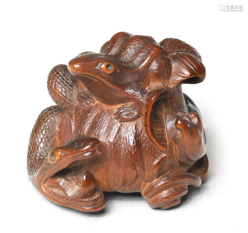 A wood netsuke of the sansukumi (three creepy things) By Arima Tomonobu, Nagoya, 19th century