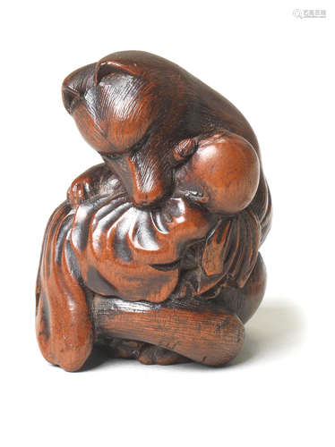 A wood netsuke of Kuzunoha By Masakazu, Nagoya, 19th century