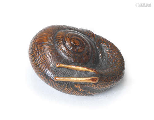 A wood netsuke of a snail By Tameoto, 19th century