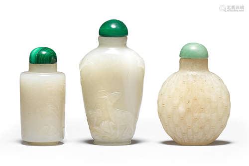 Three pale green jade snuff bottles 18th/19th century