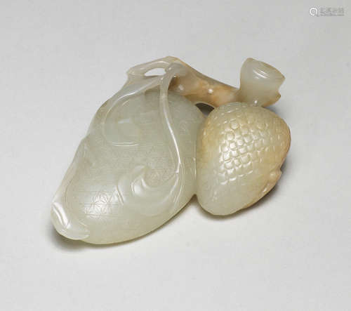 A pale green jade carving of lychee 17th century