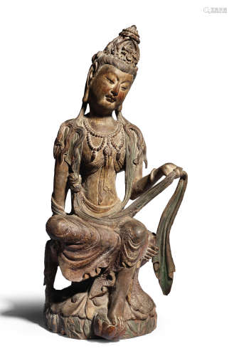 A carved wood figure of Guanyin Qing Dynasty