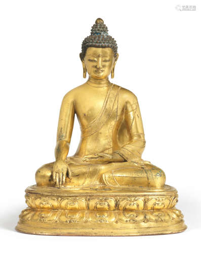 A very rare gilt-bronze figure of Buddha Shakyamuni Tibet, 15th century