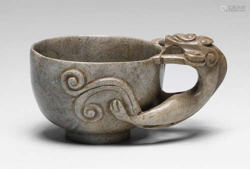 A 'chicken-bone' jade 'chilong' cup Ming Dynasty