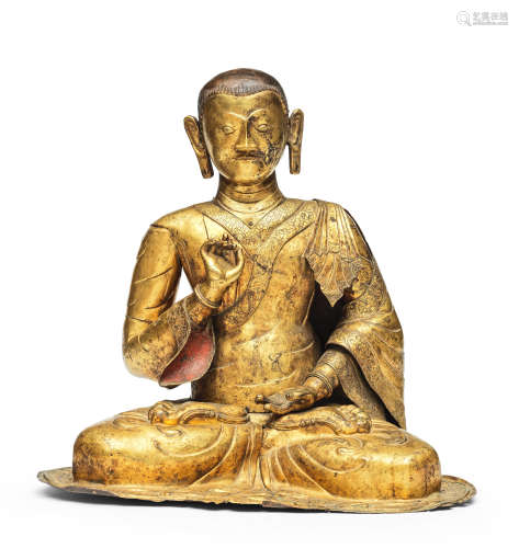 A very large gilt copper-alloy repoussé figure of a Kagyu Lama 17th century