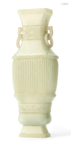 A very pale green jade archaistic vase, hu Qianlong