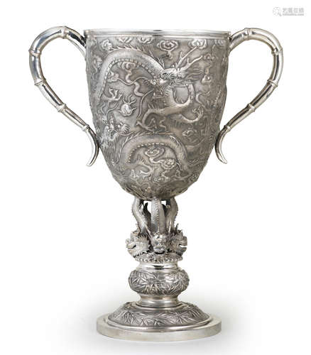 A large Chinese export silver 'dragon' trophy WH Xiechang 90 mark, late 19th century, dated by inscription to the 20th year of the Guangxu reign corresponding to 1894, and of the period