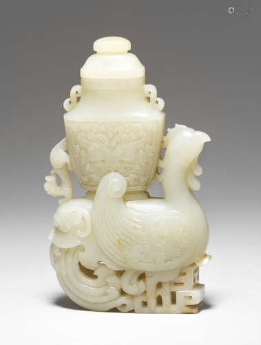 A very pale green jade archaistic 'heavenly bird' vase and cover Qianlong