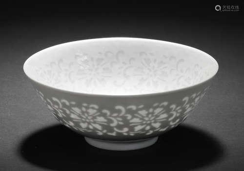 A very rare white glazed 'cut-through' 'lotus' bowl Qianlong seal mark and of the period